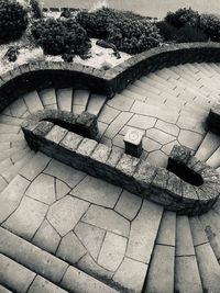 High angle view of stone wall by empty park