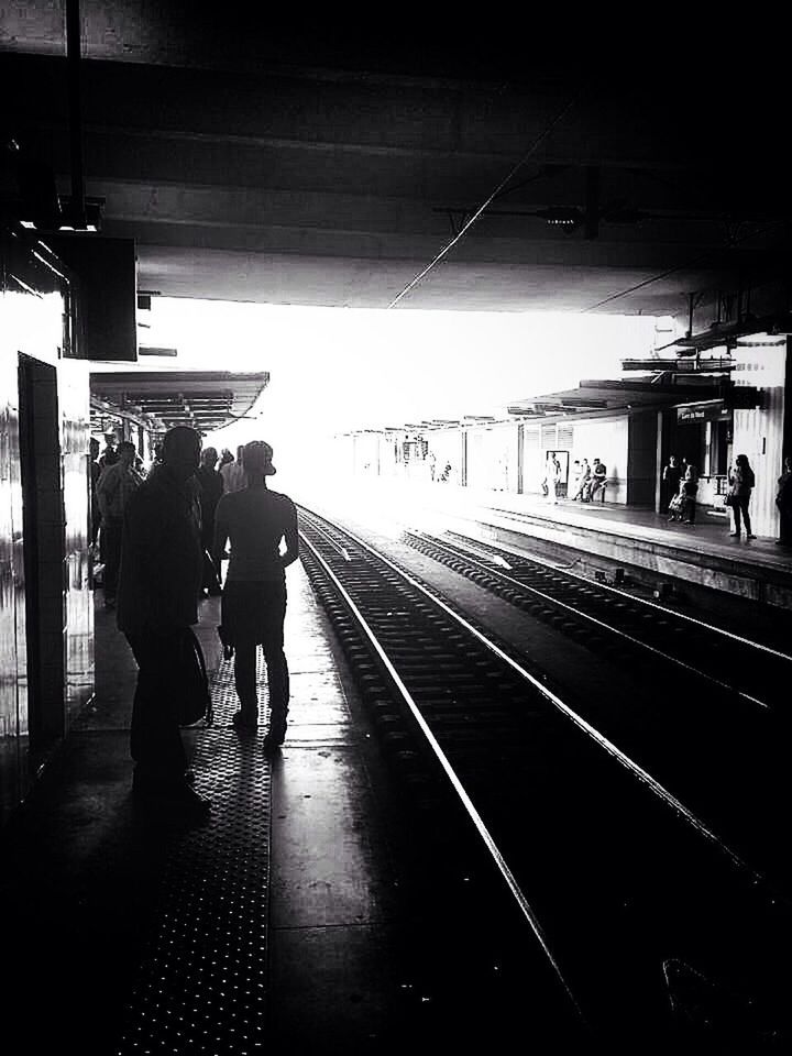 indoors, railroad station platform, railroad station, public transportation, transportation, men, rail transportation, railroad track, passenger, subway station, subway, walking, train - vehicle, lifestyles, person, full length, passenger train, travel, waiting