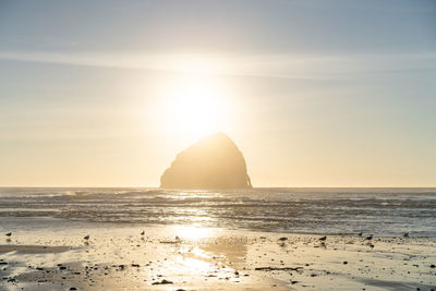 Scenic view of sea against sky during sunset