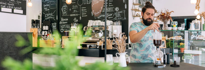 Portrait of woman standing in store