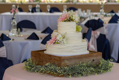 Full frame view of a wedding cake and decorations before the ceremony and reception