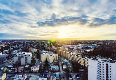 Aerial view of cityscape against sky