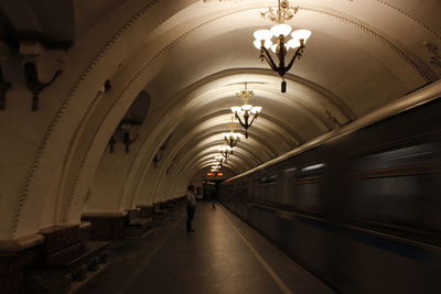 Interior of illuminated subway station