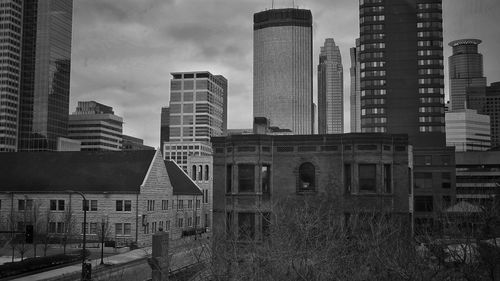 Low angle view of skyscrapers against sky