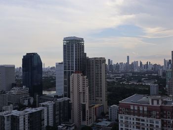 Modern buildings in city against sky