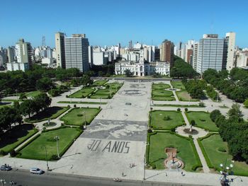 High angle view of buildings in city against sky