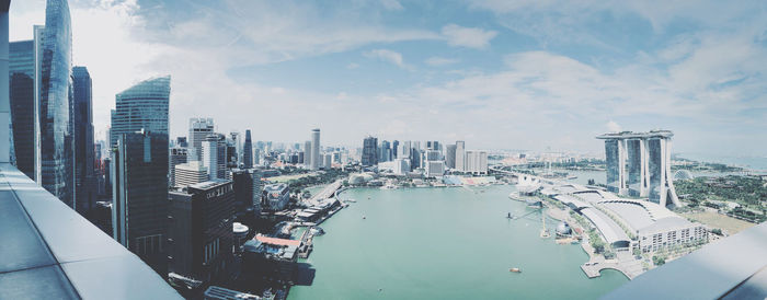 High angle view of modern buildings against sky