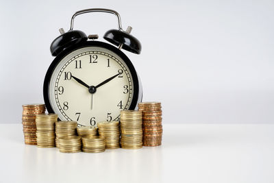 Clock tower against white background