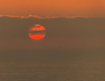 Scenic view of orange sky