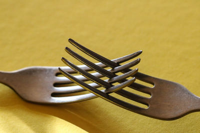 High angle view of fork on table