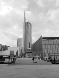 Modern buildings in city against sky