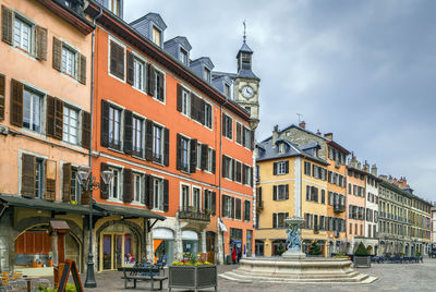 Street with historical houses in chambery city center, france