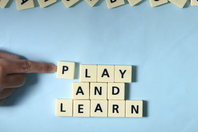 Human hand holding text