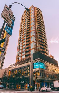 Low angle view of office building against sky
