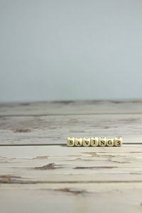 Close-up of coins on table