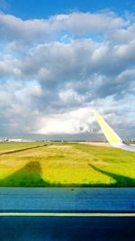 Scenic view of landscape seen through airplane window