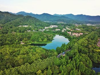 High angle view of plants and mountains against sky