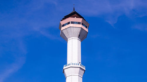 Low angle view of building against blue sky