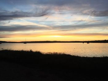 Scenic view of sea against sky during sunset