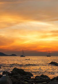 Scenic view of sea against sky during sunset