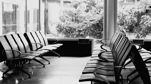 Empty chairs and table in restaurant