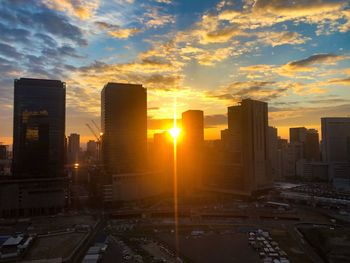 High angle view of buildings against sky during sunset