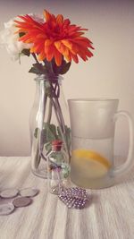 Close-up of flowers in vase on table