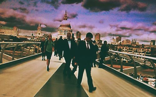 Buildings in city against sky