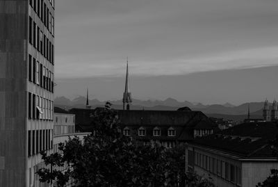 Buildings in city against sky