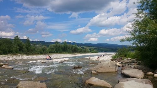 Scenic view of river against sky