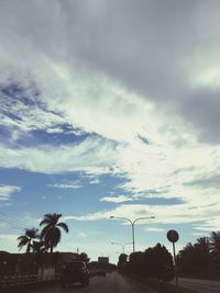 View of road against cloudy sky