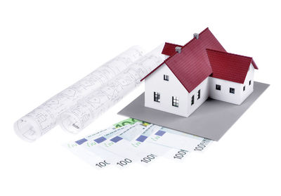 High angle view of toy on building against white background