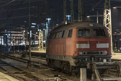 Train on railroad track at night