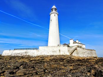 Low angle view of lighthouse against sky