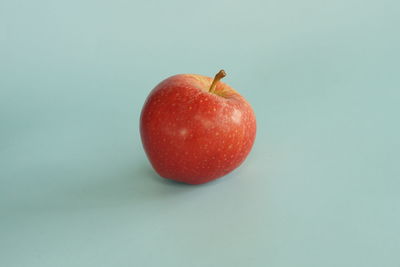 Close-up of apple against white background