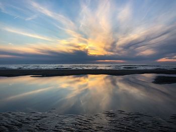 Scenic view of sea against sky during sunset