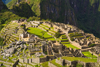 A sapurb view of the ruins of machu picchu , an ancient inca city in the sky