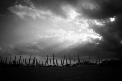 Scenic view of landscape against cloudy sky