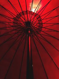 Low angle view of ferris wheel against sky