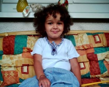 Portrait of a smiling girl sitting