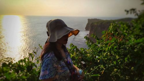 Waiting for the sunset at the end of the island of bali