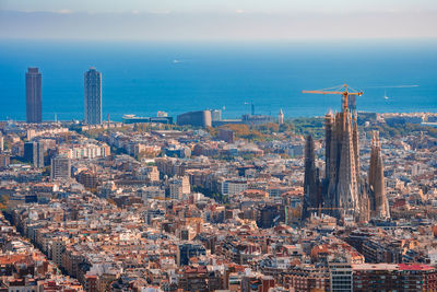 Aerial view of cityscape against sky