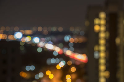 Defocused image of illuminated lights at night