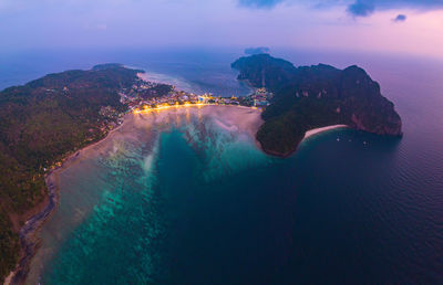 High angle view of sea against cloudy sky