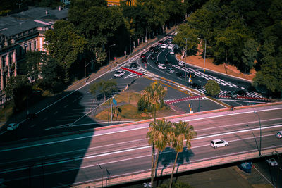 High angle view of light trails on road in city