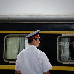 Man standing in train