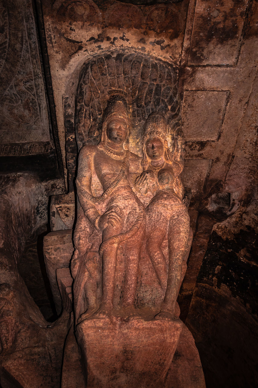 LOW ANGLE VIEW OF STATUE OF BUDDHA