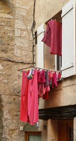 Clothes drying hanging on wall