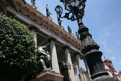 Low angle view of historic building against sky