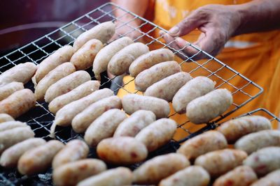 Midsection of man preparing food